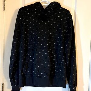 Nike men’s small black hoodie with gold swoosh design.